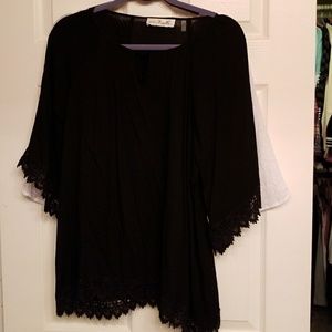 2 Tunics 1 white. 1 black